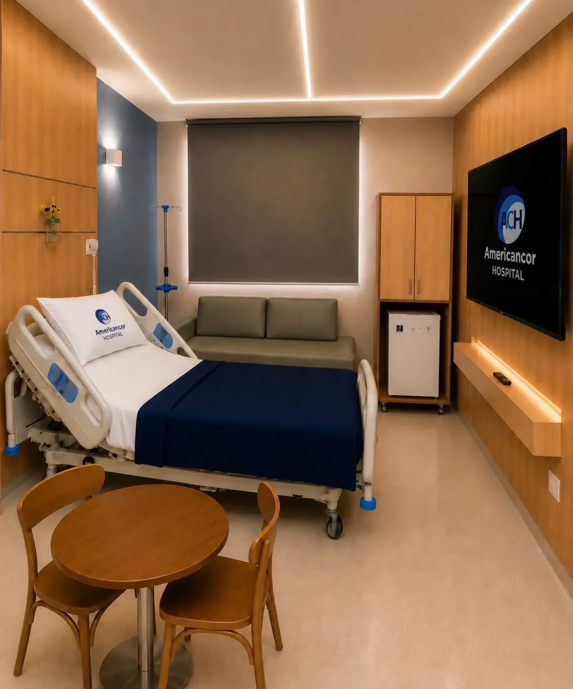 Suíte premium do Hospital AmericanCor com televisão e espaço para acompanhante